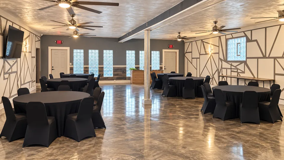 The Cloud Room: round tables and glass-block windows